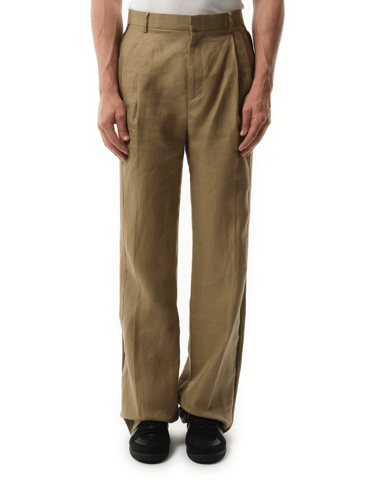 Image of a model wearing Pants. Productname: GIVENCHY Podium Trousers in BROWN colour by brand - GIVENCHY