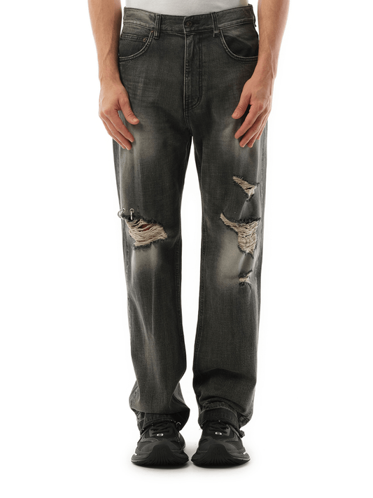 Image of a model wearing Denim. Productname: WE11DONE Distressed Denim Jeans in BLACK colour by brand - WE11DONE