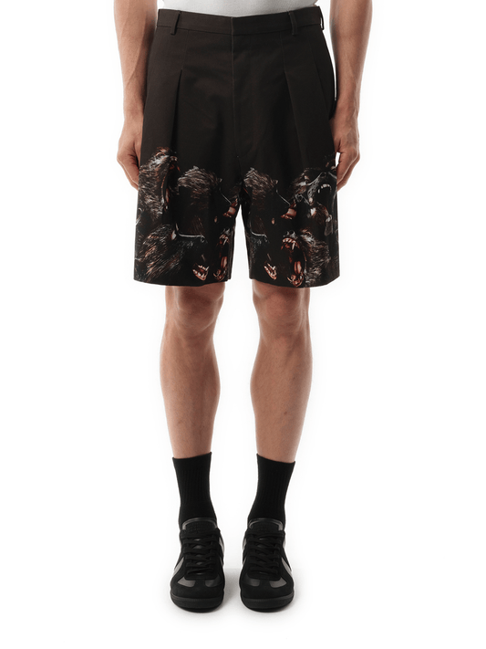 Image of a model wearing Shorts. Productname: GIVENCHY Bermuda in BLACK colour by brand - GIVENCHY
