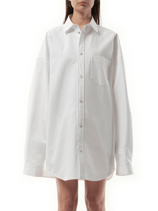Image of a model wearing Tops. Productname: BALENCIAGA Cotton Poplin Outwear Shirt in White colour by brand - BALENCIAGA