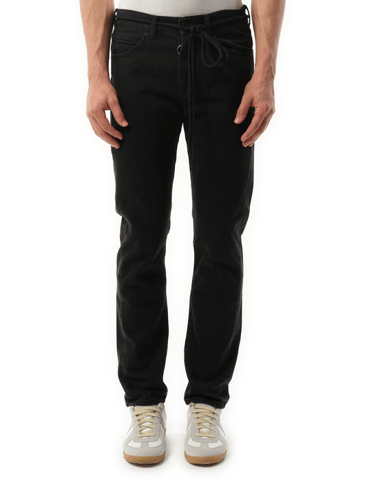 Image of a model wearing Denim. Productname: OFF-WHITE E.M Slim Jeans in BLACK colour by brand - OFF-WHITE