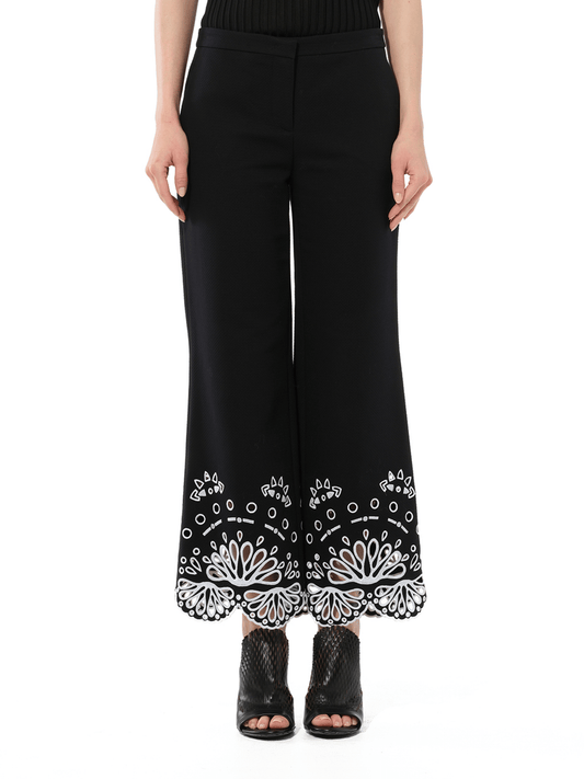 Image of a model wearing Pants. Productname: PUCCI Trousers in Black colour by brand - PUCCI