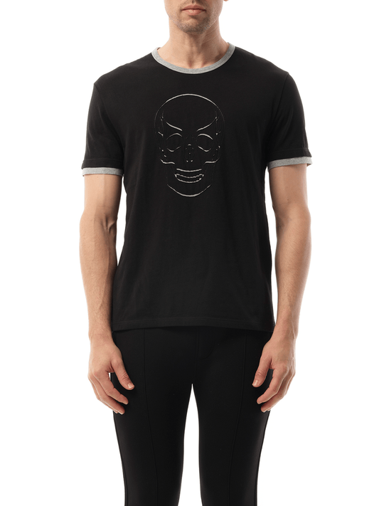 Image of a model wearing Tops. Productname: ALEXANDER MCQUEEN Skull T-Shirt in BLACK colour by brand - ALEXANDER MCQUEEN