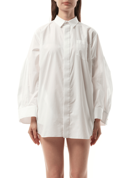 Image of a model wearing Dress. Productname: SACAI Balloon Sleeve Shirt Dress in Off White colour by brand - SACAI
