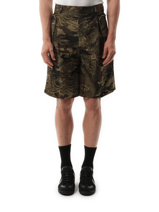 Image of a model wearing Shorts. Productname: GIVENCHY Podium Dollar Bermuda in GREEN colour by brand - GIVENCHY