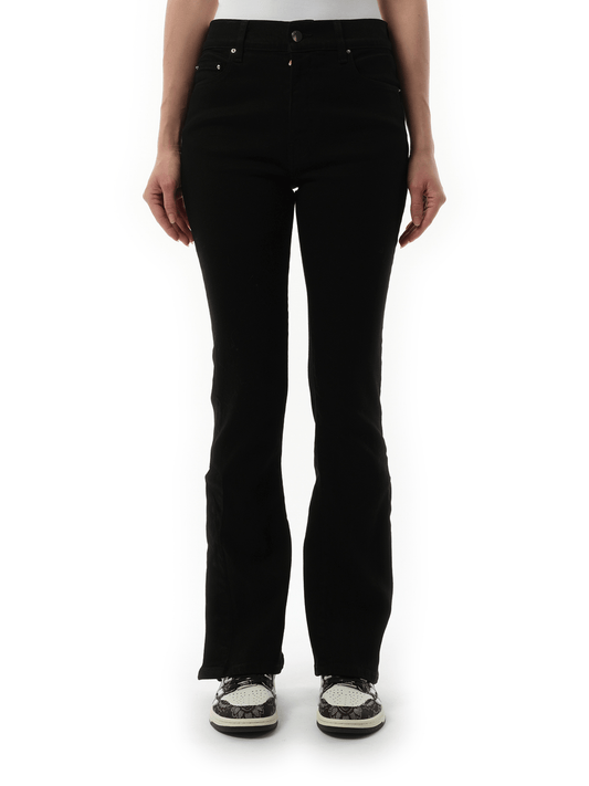 Image of a model wearing Denim. Productname: AMIRI Kick Flare Jeans in Black OD colour by brand - AMIRI