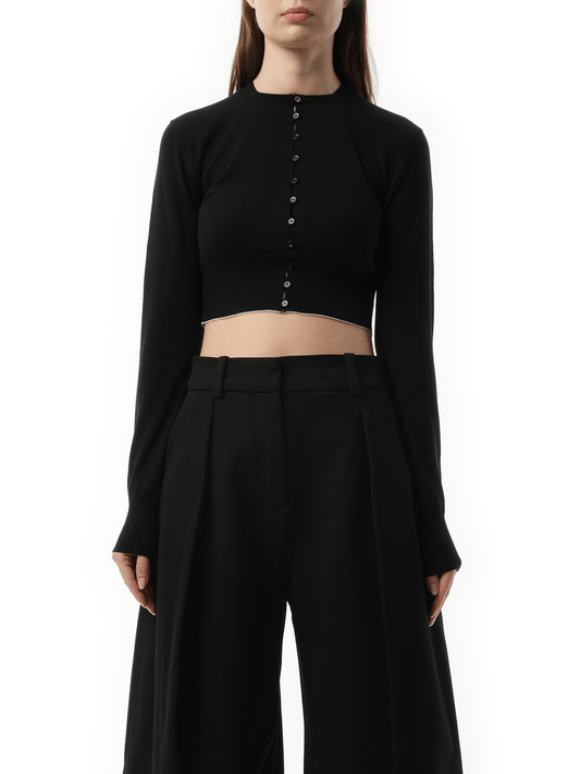 Image of a model wearing Outerwear. Productname: JACQUEMUS Le Cardigan Spiaggia in Black colour by brand - JACQUEMUS