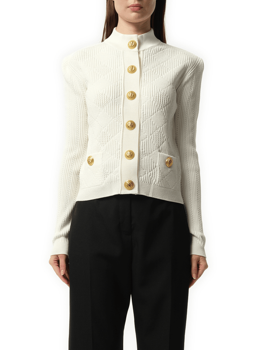 Image of a model wearing Outerwear. Productname: BALMAIN Buttoned 2 Pockets Vichy Knit Cardigan in White colour by brand - BALMAIN