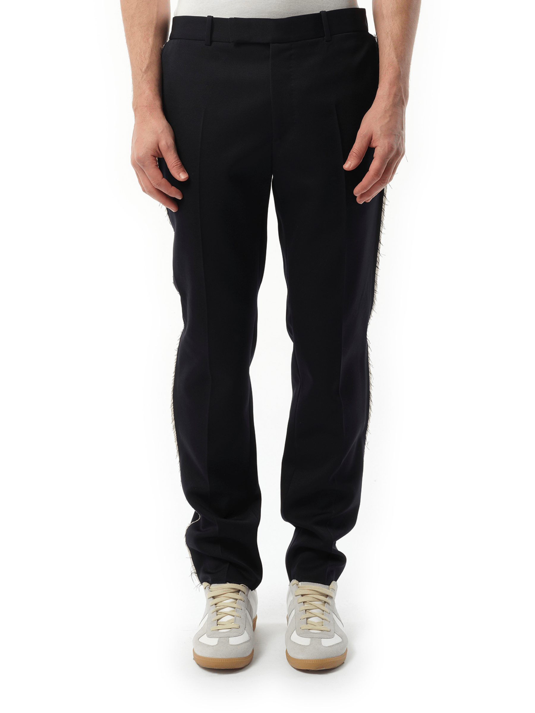 Image of a model wearing Pants. Productname: ALEXANDER MCQUEEN Slim Cut Pants in NAVY colour by brand - ALEXANDER MCQUEEN