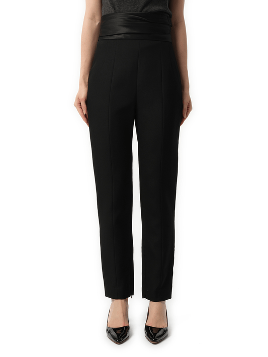 Image of a model wearing Pants. Productname: KHAITE Lenro Pants in Black colour by brand - KHAITE