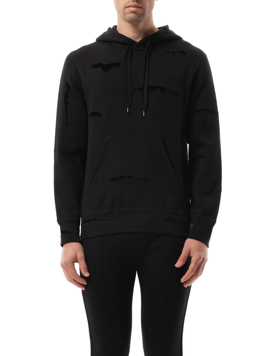 Image of a model wearing Outerwear. Productname: ALEXANDER MCQUEEN Shredded Hoodie in BLACK colour by brand - ALEXANDER MCQUEEN