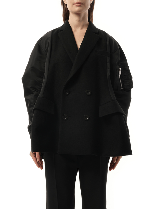 Image of a model wearing Outerwear. Productname: SACAI Wool Melton x Nylon Twill Quilted Coat in BLACK colour by brand - SACAI