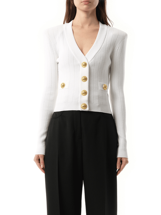 Image of a model wearing Outerwear. Productname: BALMAIN Buttoned Knit Crop Cardigan in WHITE colour by brand - BALMAIN