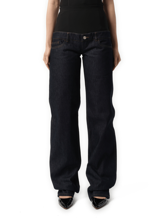Image of a model wearing Denim. Productname: COPERNI Jersey Hybrid Denim Trouser in Blue Raw colour by brand - COPERNI