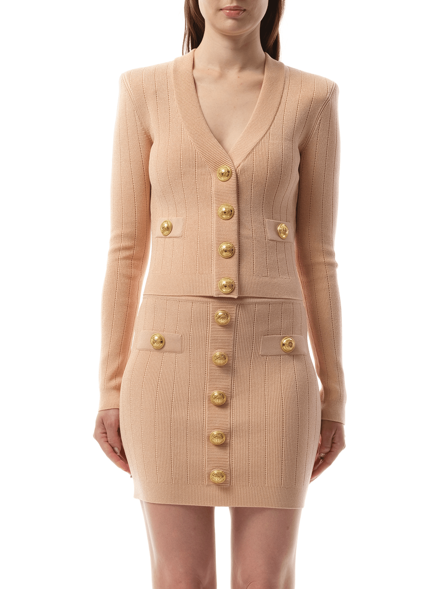 Image of a model wearing Outerwear. Productname: BALMAIN V-Neck 2 Pockets Buttoned Knit Cardigan in Nude Rose colour by brand - BALMAIN