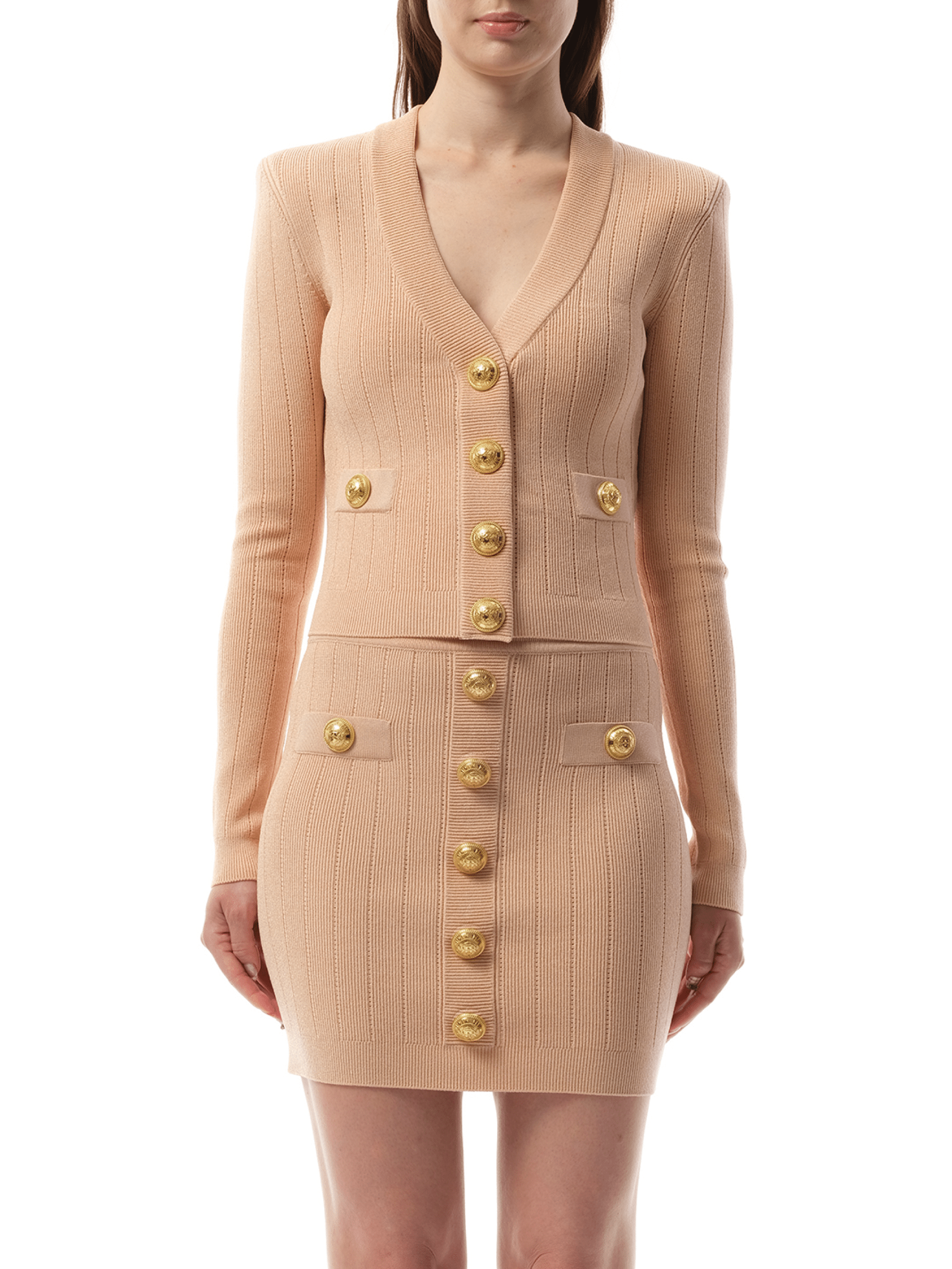 Image of a model wearing Outerwear. Productname: BALMAIN V-Neck 2 Pockets Buttoned Knit Cardigan in Nude Rose colour by brand - BALMAIN