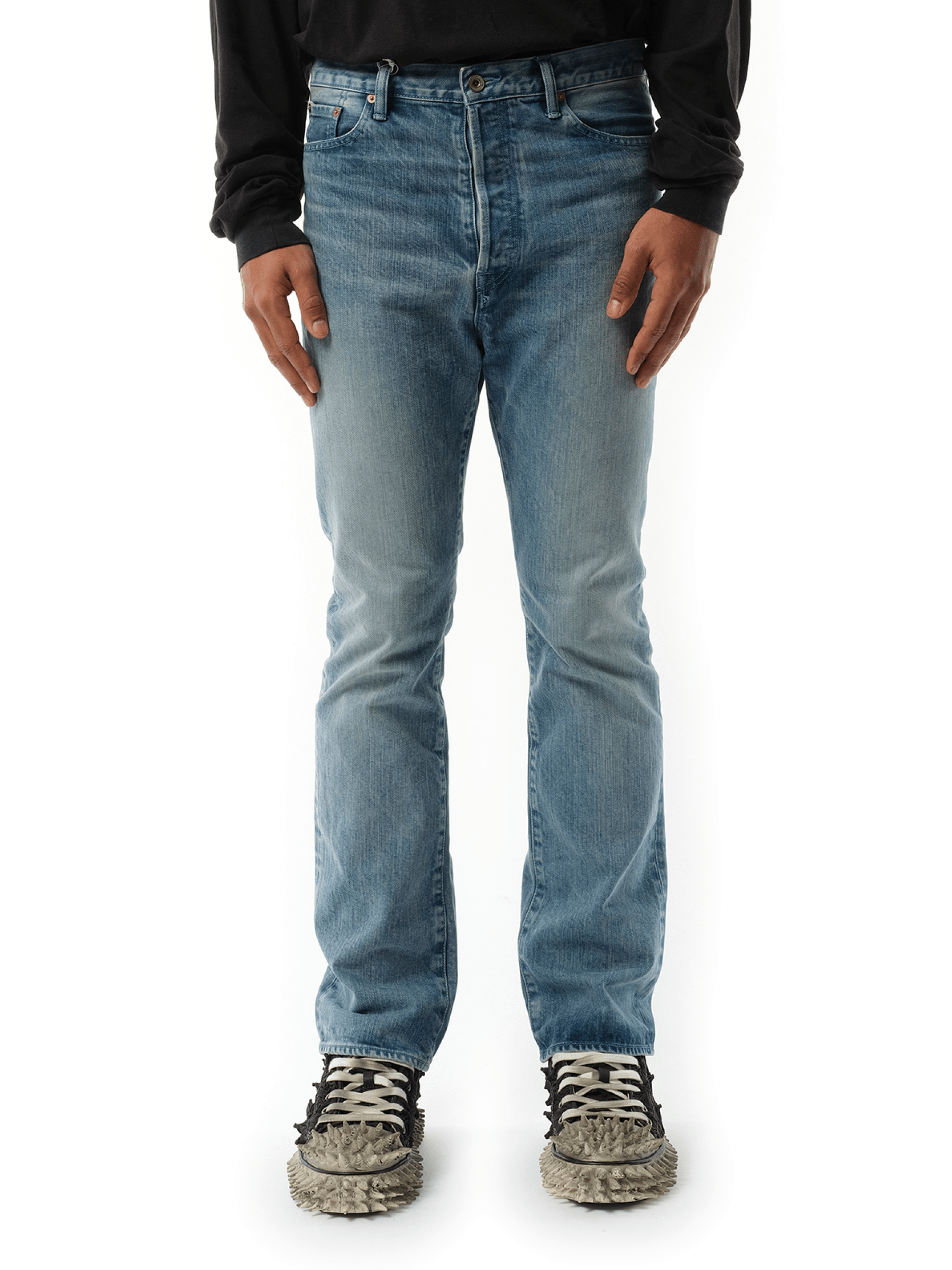 Image of a model wearing Denim. Productname: DOUBLET Care Denim Pants in BLUE colour by brand - DOUBLET