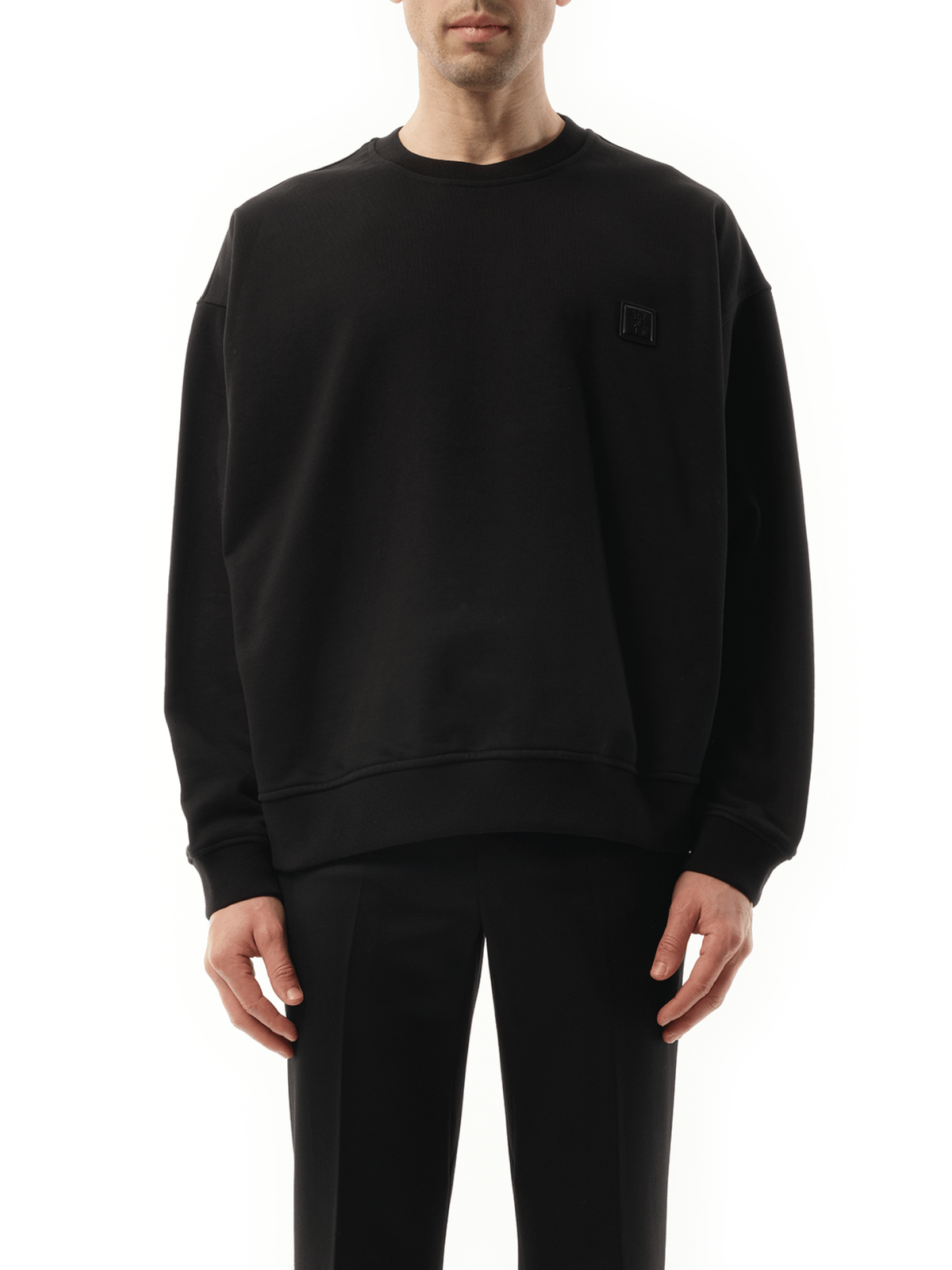 Image of a model wearing Outerwear. Product name - PariSeoul Sweatshirt in Black colour by brand - WOOYOUNGMI