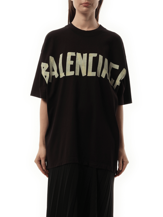 Image of a model wearing Dress. Productname: BALENCIAGA T-Shirt Pleated Dress in Black colour by brand - BALENCIAGA