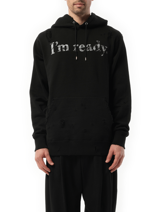 Image of a model wearing Outerwear. Product name - Hoodie in Black colour by brand - MASTERMIND