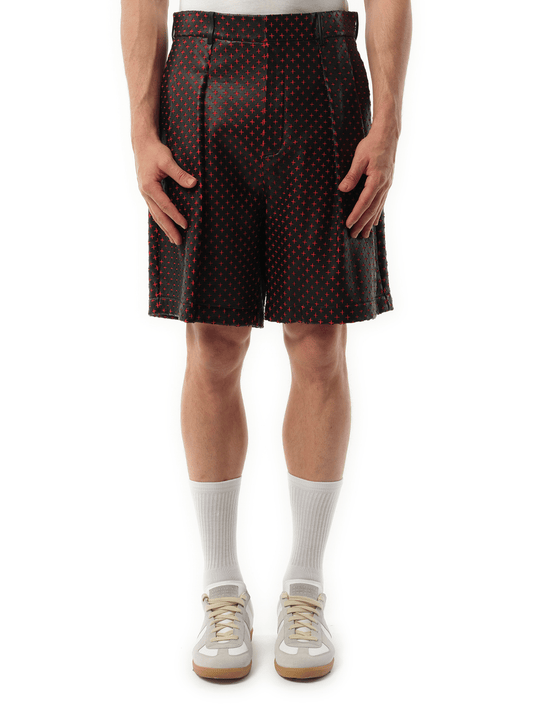 Image of a model wearing Shorts. Productname: GIVENCHY Leather Bermuda in Black colour by brand - GIVENCHY