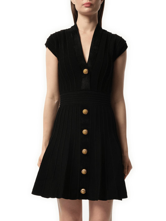 Image of a model wearing Dress. Productname: BALMAIN Button V-Neck Velvet Flare Short Dress in Black colour by brand - BALMAIN