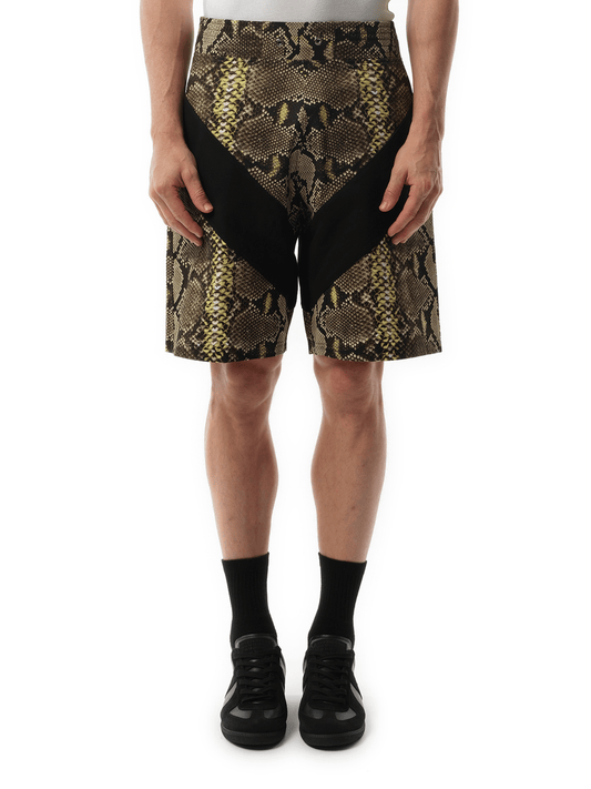 Image of a model wearing Shorts. Productname: GIVENCHY Snake Print Bermuda in BEIGE colour by brand - GIVENCHY