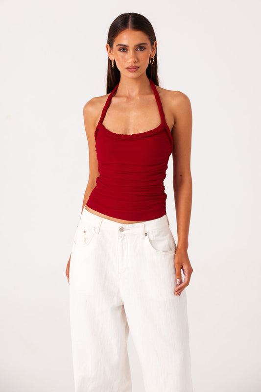 Image of a model wearing Tops. Productname: SNDYS GIANNA TOP in Deep Red colour by brand - SNDYS