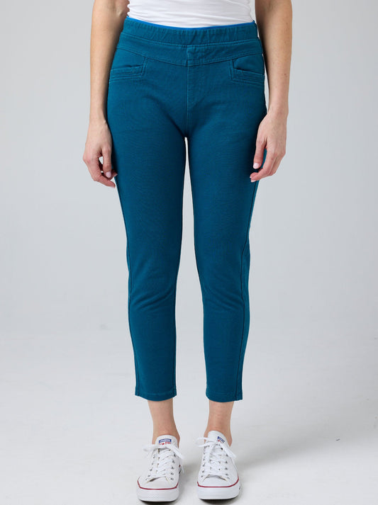 Image of a model wearing Pants. Productname: GABRIELLA FRATTINI CAPRI LUSTRE PANT in Petrol colour by brand - Gabriella Frattini