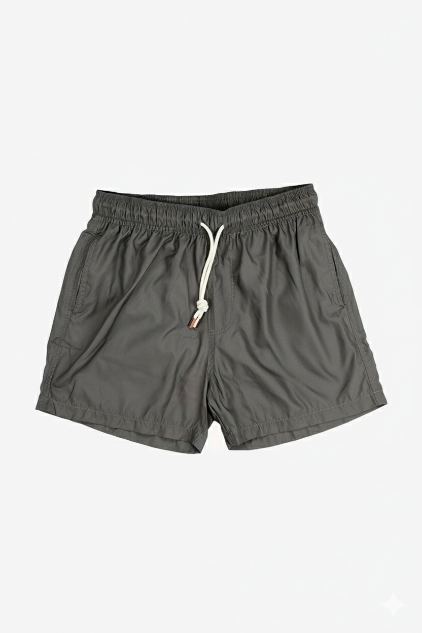 Image of a model wearing Shorts. Product name - Eufemia Olive Swim Shorts in Olive colour by brand - Anthony Squires