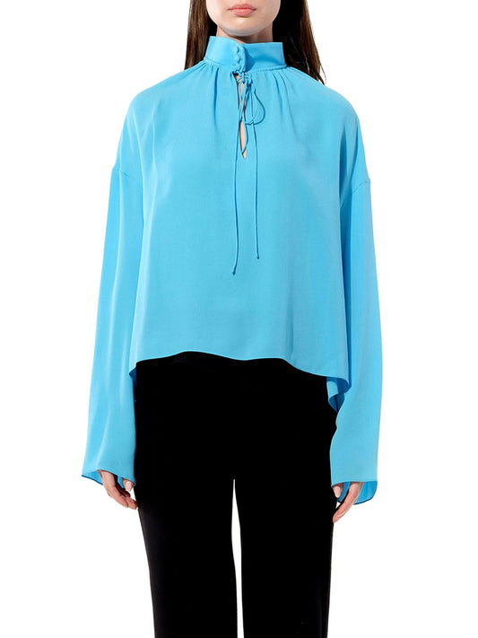 Image of a model wearing Tops. Productname: BALENCIAGA Georgette Shirt in BLUE colour by brand - BALENCIAGA