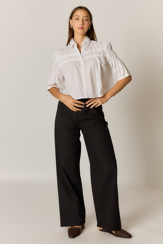 Image of a model wearing Tops. Product name - Giliann Edie Top White in White colour by brand - Giliann