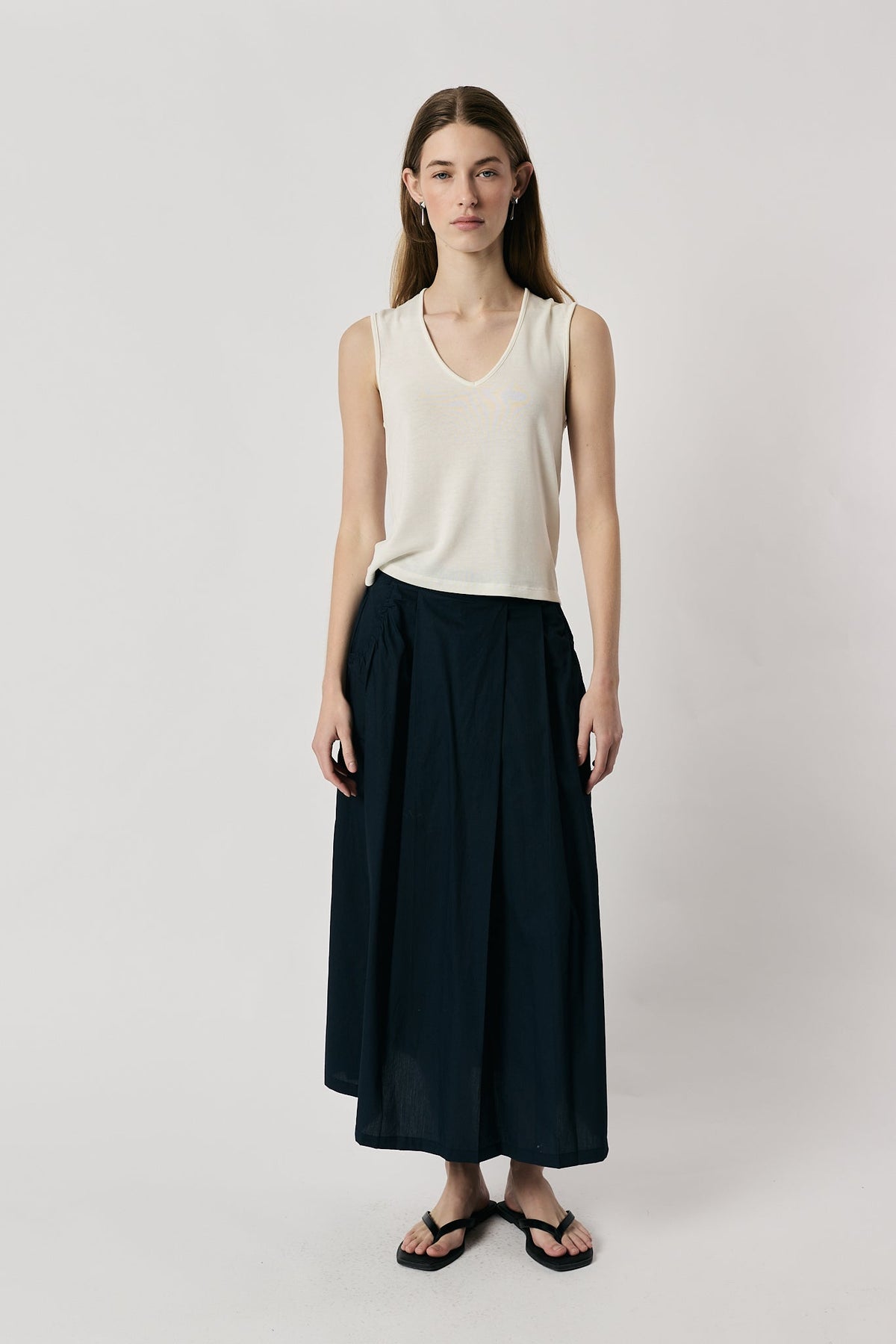 Image of a model wearing Skirts. Product name - Giliann Ines Skirt Navy in Navy colour by brand - Giliann