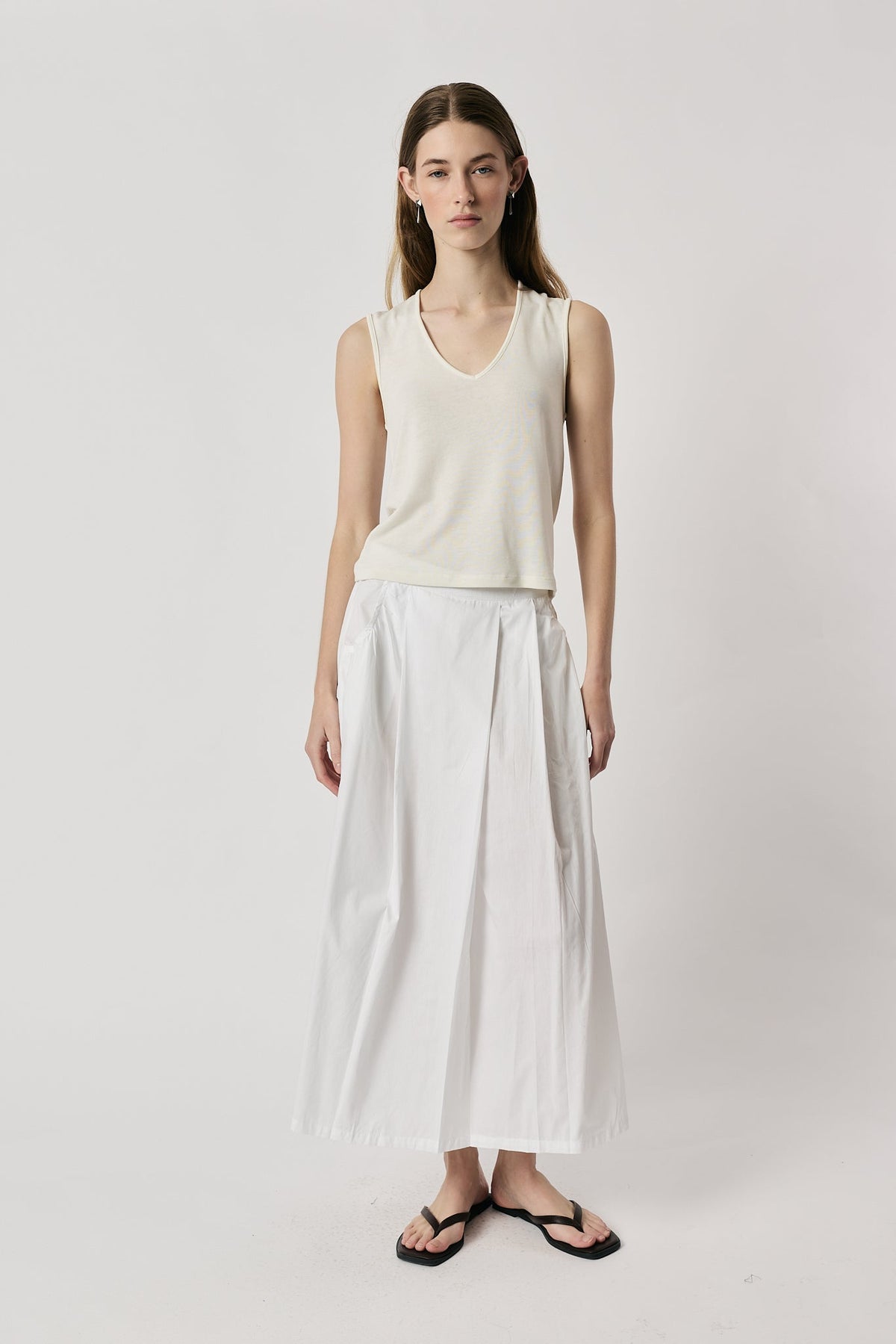 Image of a model wearing Skirts. Product name - Giliann Ines Skirt White in White colour by brand - Giliann