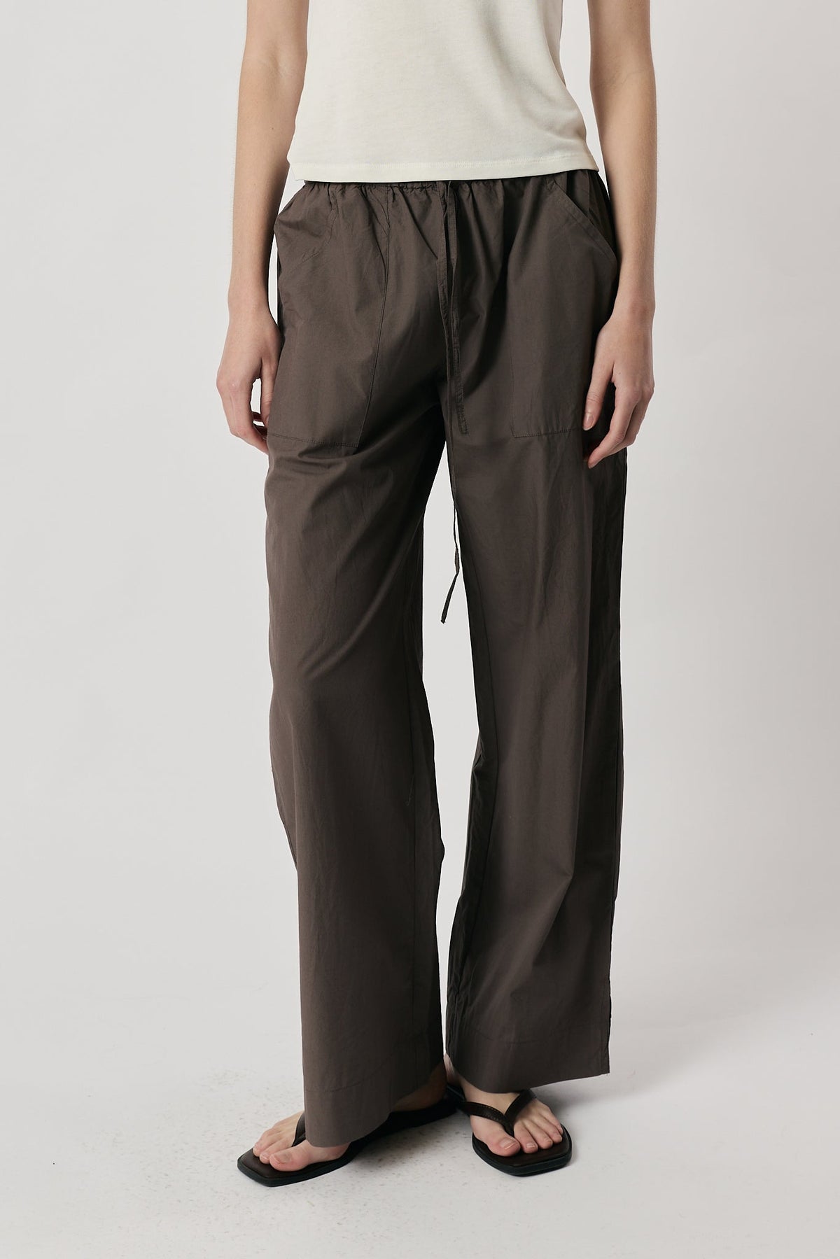 Image of a model wearing Pants. Product name - Giliann Koval Pant Charcoal in Charcoal colour by brand - Giliann
