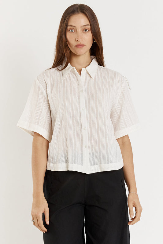 Image of a model wearing Tops. Product name - Giliann Cassis Short Sleeve in Sleeve colour by brand - Giliann
