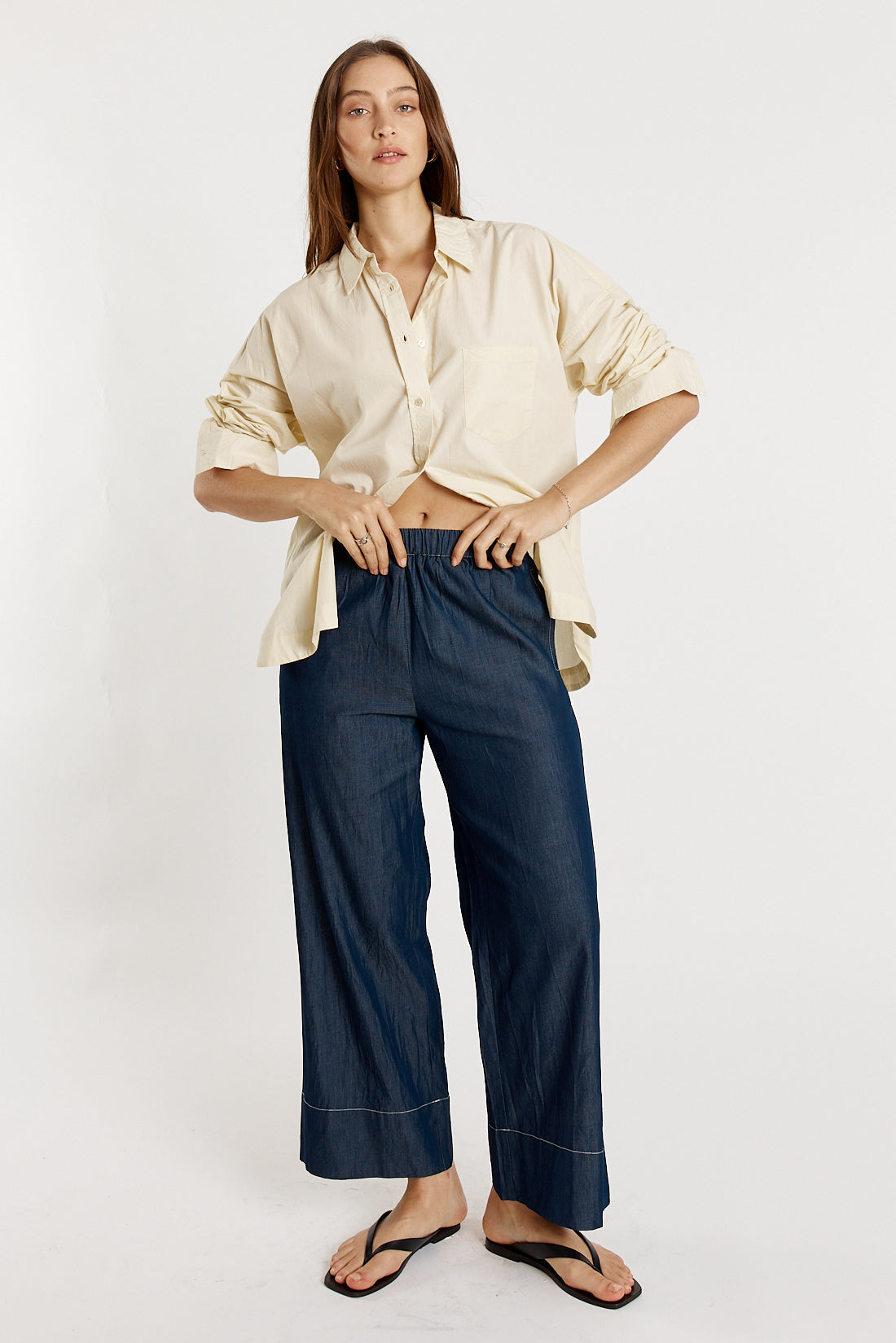 Image of a model wearing Pants. Productname: Giliann Gimlet Pant in Pant colour by brand - Cowgirl Surfer