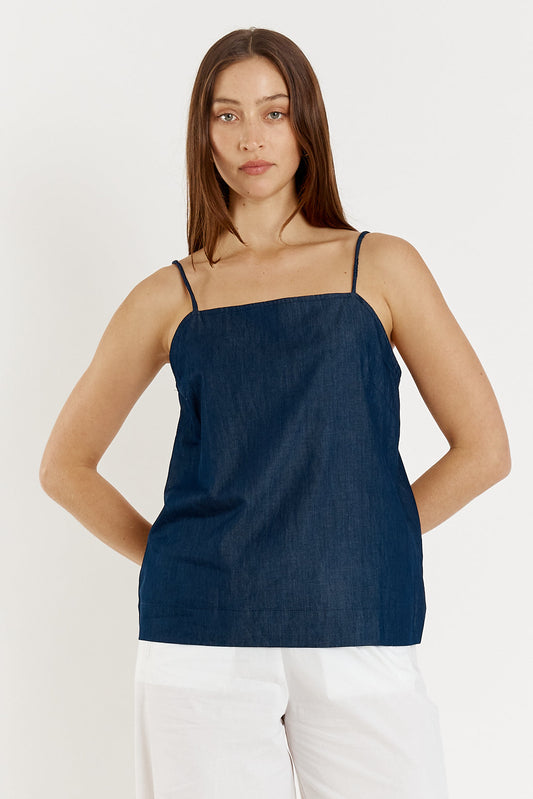 Image of a model wearing Tops. Productname: Giliann Gimlet Singlet Denim in Denim colour by brand - Giliann