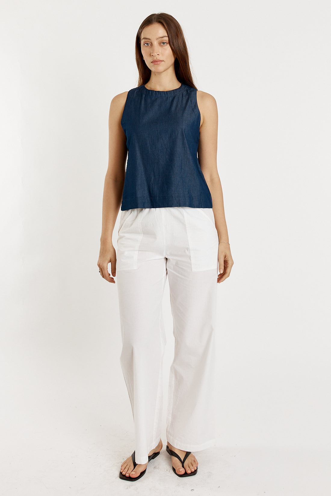 Image of a model wearing Tops. Productname: Giliann Lolita Singlet Denim in Denim colour by brand - Giliann
