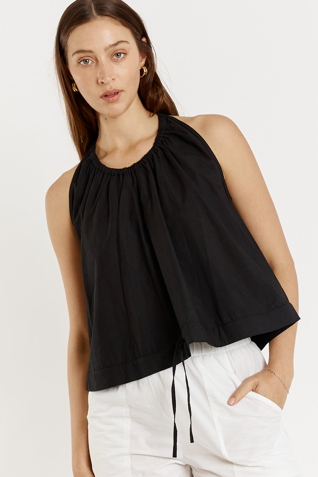 Image of a model wearing Tops. Productname: Giliann Pelle Top Black in Black colour by brand - Giliann