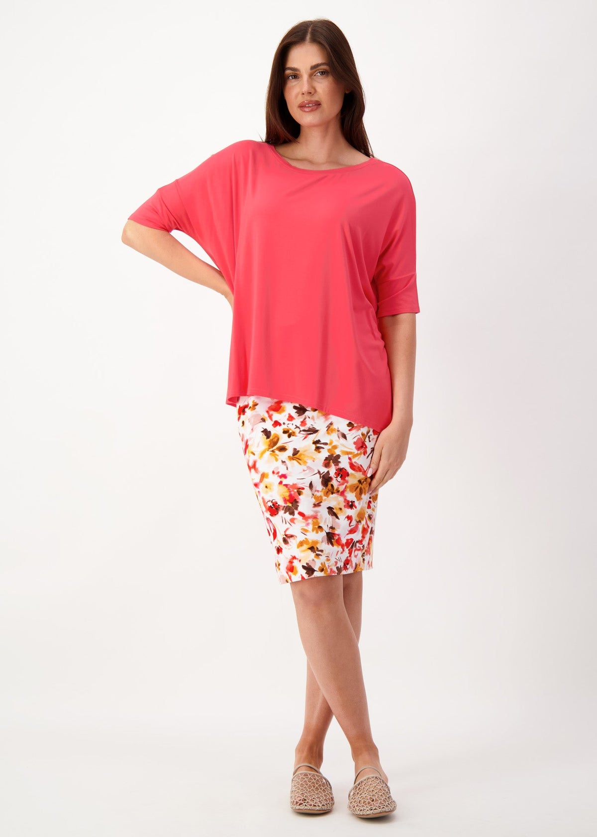 Image of a model wearing Tops. Product name - Gina Oversized Slouch Bamboo T-Shirt Berry in Berry colour by brand - Lou Lou