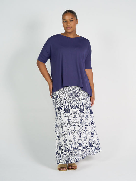 Image of a model wearing Tops. Product name - Gina Oversized Slouch Bamboo T-Shirt Blue in Blue colour by brand - Lou Lou