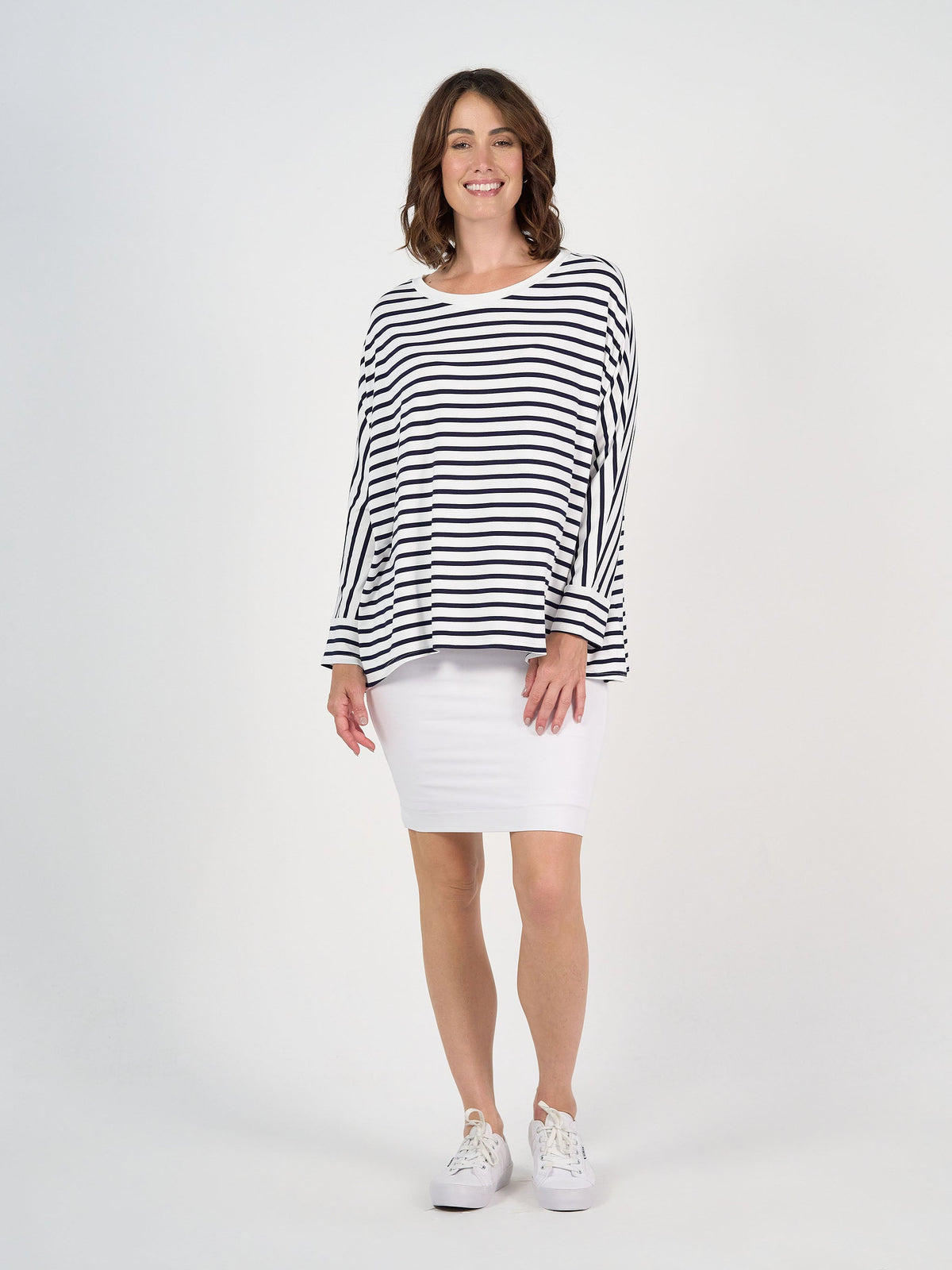Image of a model wearing Tops. Product name - Gina Long Sleeved Bamboo Top Navy & White Stripe in Navy & White Stripe colour by brand - Lou Lou