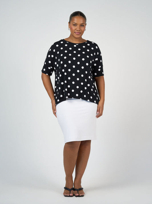 Image of a model wearing Tops. Product name - Gina Oversized Slouch Bamboo T-Shirt Polka Dot in Polka Dot colour by brand - Lou Lou