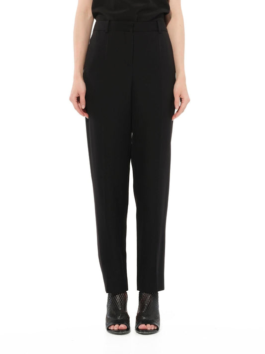 Image of a model wearing Pants. Productname: GIVENCHY Cigarette Pants in Black colour by brand - GIVENCHY