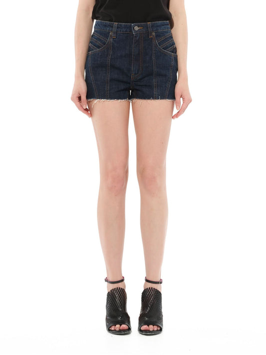 Image of a model wearing Denim. Productname: GIVENCHY Denim Shorts in Indigo colour by brand - GIVENCHY