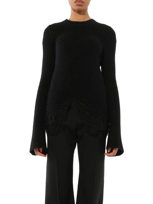 Image of a model wearing Tops. Productname: GIVENCHY Long Sleeve Top in Black colour by brand - GIVENCHY