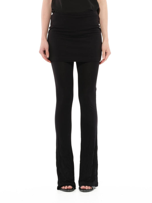 Image of a model wearing Pants. Productname: GIVENCHY Pants in Black colour by brand - GIVENCHY