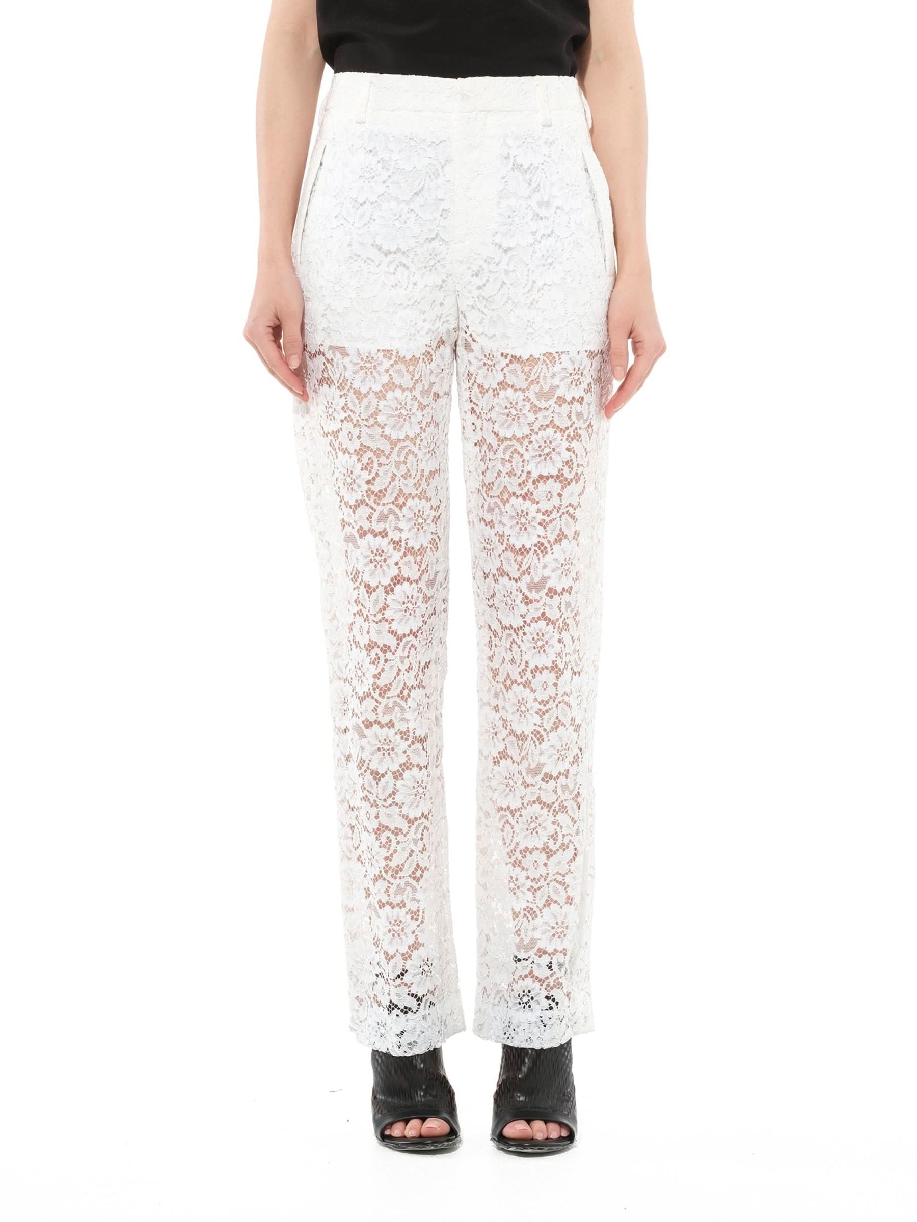 Image of a model wearing Pants. Productname: GIVENCHY Pants in White colour by brand - GIVENCHY