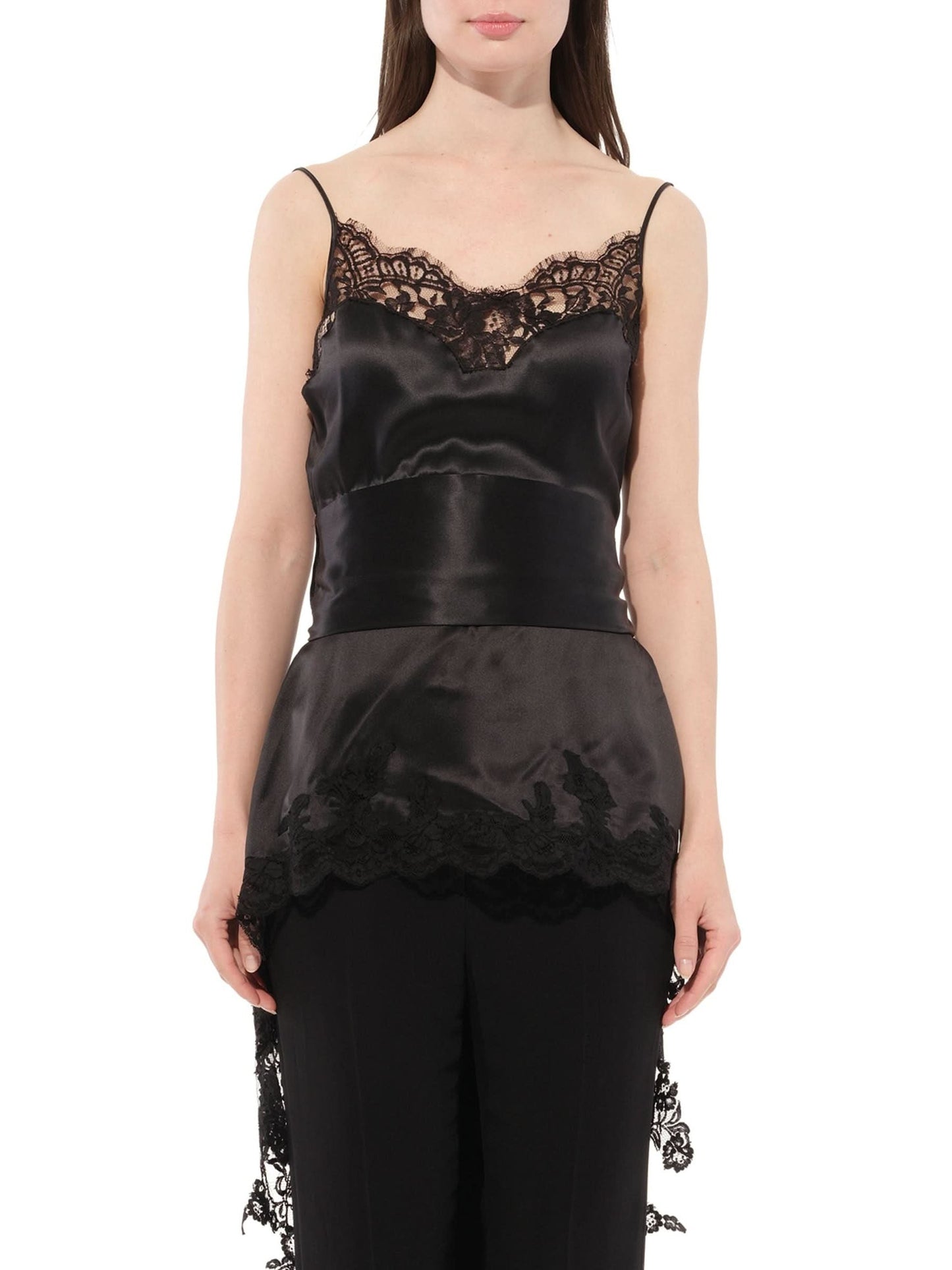 Image of a model wearing Tops. Productname: GIVENCHY Podium Top in Black colour by brand - GIVENCHY